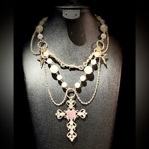 Elegant Gold and Pink Cross Necklace